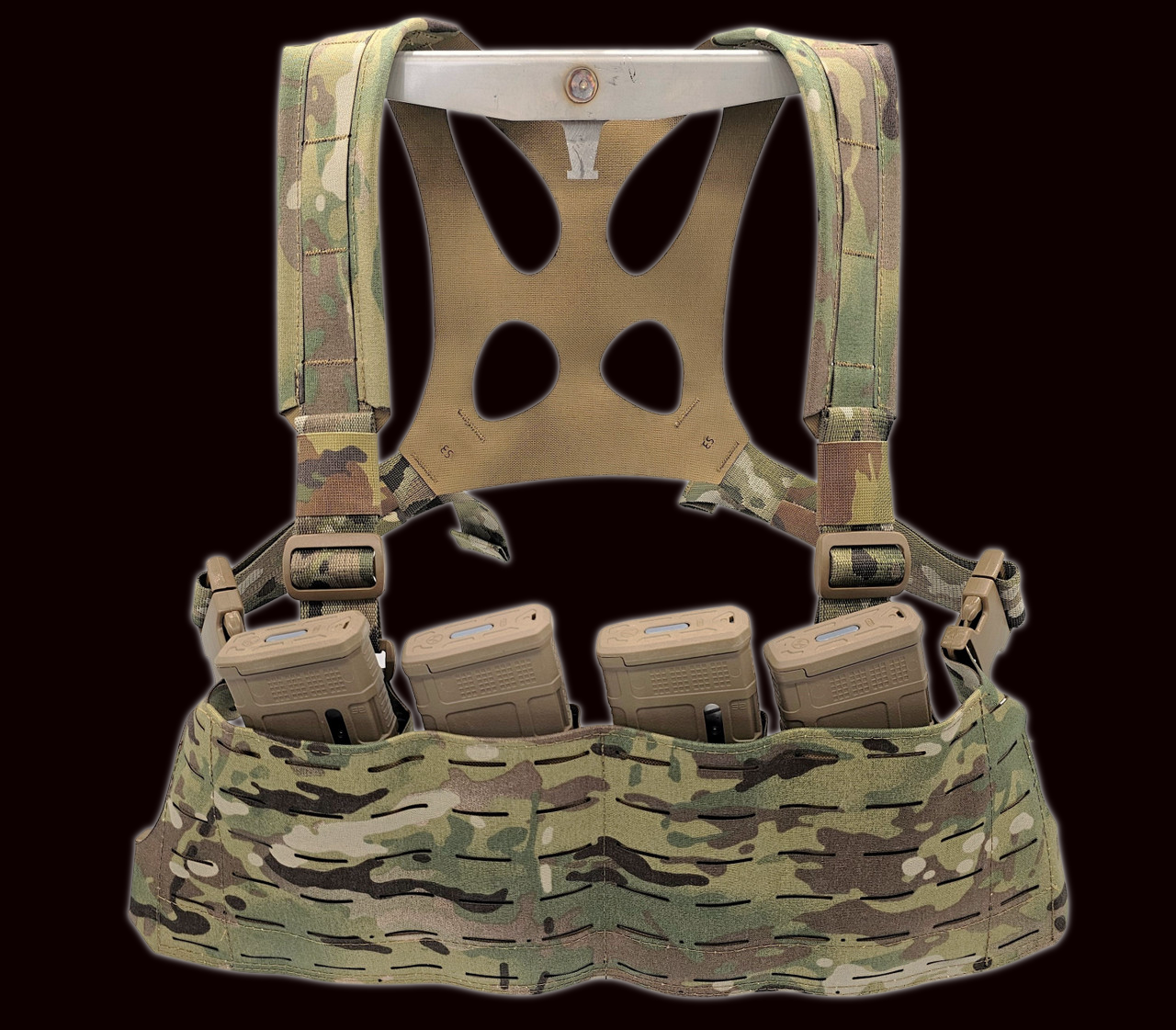 Camouflage tactical vest with multiple pouches on a black background
